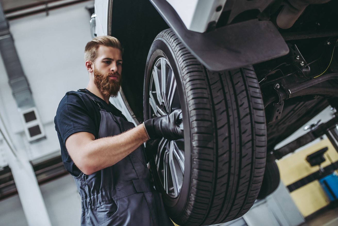 Handsome auto service mechanics.